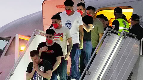 Migrants deported months before by the United States to El Salvador under the Trump administration's immigration crackdown arrive at Simon Bolívar International Airport in Maiquetia, Venezuela, July 18, 2025.