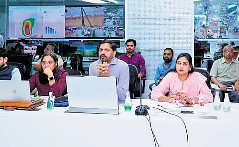 Home Minister Vangalapudi Anitha monitors the movement of Cyclone Ditwah from the RTGS Centre at the State Secretariat on Sunday.