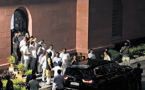 Chief Minister A Revanth Reddy interacts with his Cabinet colleagues as they step out after addressing a press conference at the Secretariat in Hyderabad on Sunday