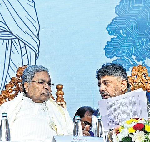CM Siddaramaiah and DCM DK Shivakumar at an event in Bengaluru on Monday. Shivakumar will host Siddaramaiah for breakfast on Tuesday