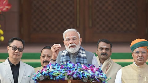 Prime Minister Narendra Modi addressing the media after arriving for the winter session of Parliament in New Delhi on Monday.
