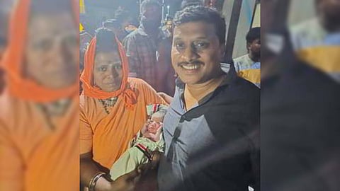 Dr. N. Kumaresan, Orthopedic surgeon, and Seethalakshmi, a Shaivite pilgrim, who helped the woman in labor deliver a baby.