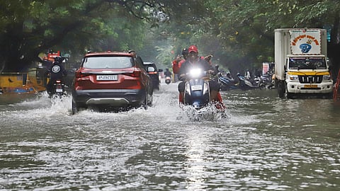 Chennai city witnessed constatnt rain leaving the streets flooded. People seen moving on the flooded rain water at the 5th Avenue Anna Nagar on Tuesday.