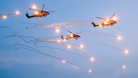 Navy personnel stage a high-intensity rescue and combat demonstration off Shankhumukham beach in Thiruvananthapuram on Monday, as part of the full dress rehearsals ahead of the Navy Day celebrations.