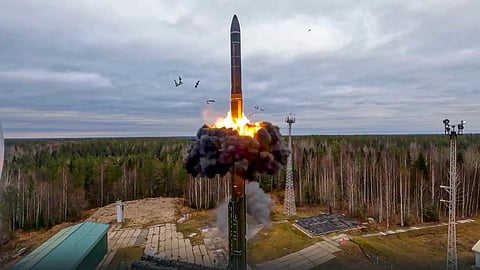 In this photo taken from a video released by the Russian Defense Ministry Press Service on Oct. 26, 2022, a Yars intercontinental ballistic missile is test-fired as part of Russia's nuclear drills from a launch site in Plesetsk, northwestern Russia.