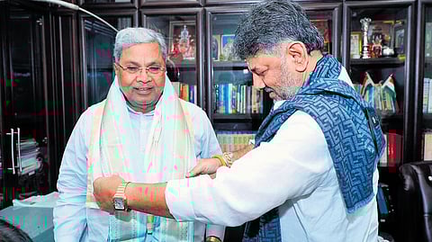 Deputy Chief Minister DK Shivakumar welcomes CM Siddaramaiah at his residence for breakfast in Bengaluru.