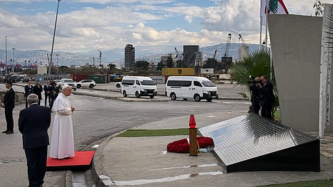 Pope Leo XIV prays at a memorial for the victims of the 2020 Beirut port explosion at the site of the explosion in Beirut, Lebanon, Tuesday, Dec. 2, 2025.