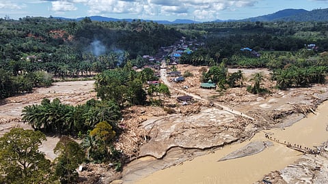 This aerial photo taken using a drone shows a village affected by a flash flood in Batang Toru, North Sumatra, Indonesia, on Dec. 1, 2025.