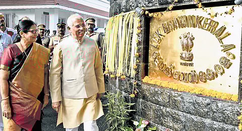 Governor Rajendra Arlekar inspecting the newly installed ‘Lok Bhavan Kerala’ name board at the official residence on Wednesday.