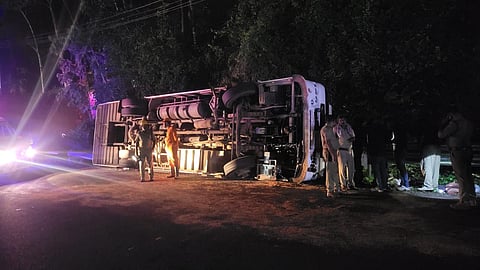 Tourist bus carrying students from GHSS, Thonnakal overturned at Nellappara in the wee hours of Wednesday.
