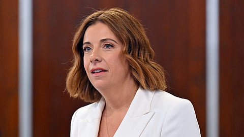 Australia's Communications Minister Anika Wells speaks at the National Press Club in Canberra, Wednesday, Dec. 3, 2025.