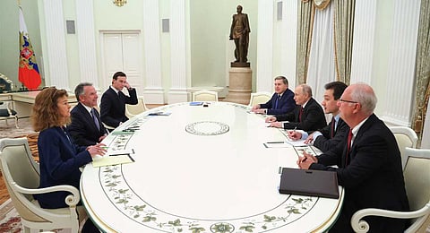 Russian President Vladimir Putin, third right, Russian Presidential foreign policy adviser Yuri Ushakov, fourth right, and Russian Direct Investment Fund CEO Special Presidential Representative for Investment and Economic Cooperation with Foreign Countries Kirill Dmitriev, right, attend talks with U.S. special envoy Steve Witkoff, second left, and Jared Kushner, U.S. President Donald Trump's son-in-law, third, at the Senate Palace of the Kremlin in Moscow, Russia, Tuesday, Dec. 2, 2025.