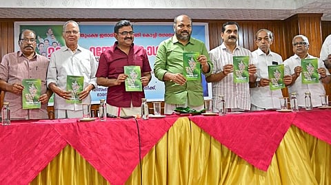 CPM central committe member P Rajive releasing LDF election manifesto for Kochi corporation. M Anilkumar, CPM Ernakulam district committee S Satheesh also seen.