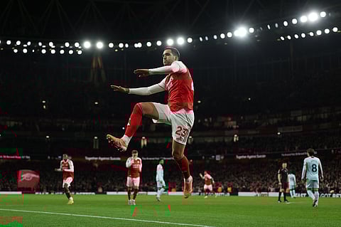 Arsenal's Mikel Merino celebrates scoring the opening goal during the English Premier League football match between Arsenal and Brentford at the Emirates Stadium in London on December 3, 2025. 