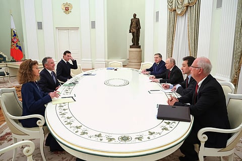 Russian President Vladimir Putin, third right, Russian Presidential foreign policy adviser Yuri Ushakov, fourth right, and Russian Direct Investment Fund CEO Special Presidential Representative for Investment and Economic Cooperation with Foreign Countries Kirill Dmitriev, right, attend talks with US special envoy Steve Witkoff, second left, and Jared Kushner, US President Donald Trump's son-in-law, third, at the Senate Palace of the Kremlin in Moscow, Russia, Tuesday, Dec. 2, 2025.