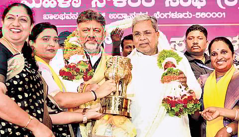 Chief Minister Siddaramaiah and Deputy CM DK Shivakumar are being felicitated at an event in Bengaluru on Thursday