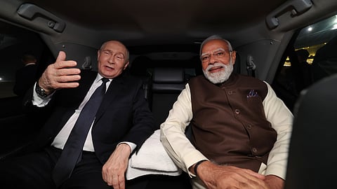 Prime Minister Narendra Modi receives Russian President Vladimir Putin upon latter's arrival in New Delhi.