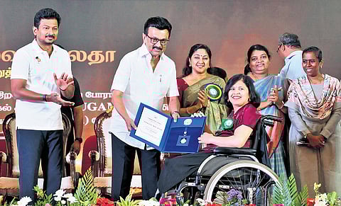 CM MK Stalin presents the award for the best social worker for serving differently-abled at the launch ceremony of Empowerment of Persons with Disabilities in local government bodies held at Valluvar Kottam in Chennai on Wednesday | express
