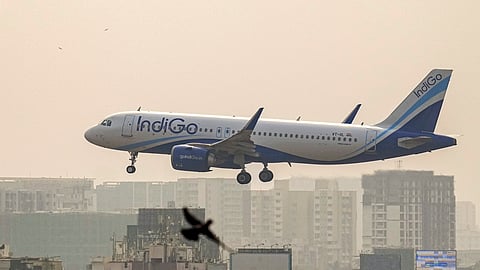 An IndiGo aircraft prepares to land at an airport, in Mumbai, Saturday, Dec. 6, 2025.