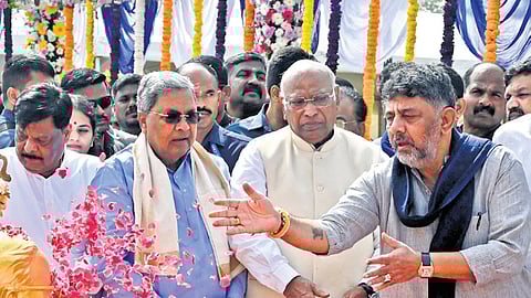 AICC president Mallikarjun Kharge, Chief Minister Siddaramaiah and Deputy Chief Minister DK Shivakumar pay tributes to Dr BR Ambedkar on his death anniversary, at Vidhana Soudha in Bengaluru on Saturday