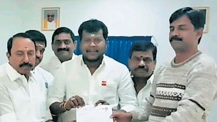 TVK leader KA Sengottaiyan
giving a letter to Erode collector
S Kandasamy on Sunday