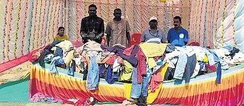 Members of the Zilla Samaj Seva Sangha at their kiosk in Thana Chowk of Bargarh town
