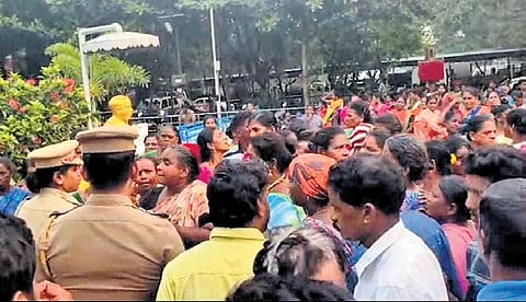 Around 200 sanitary workers from the Ambattur zone staged a protest outside the office on Saturday
