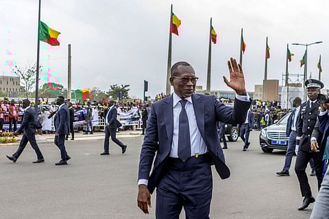 Benin's president Patrice Talon waves upon his arrival to inspect a guard of honour during the celebrations marking the 62nd independence anniversary in Cotonou, on August 1, 2022.