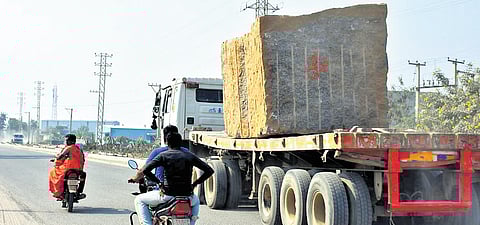 Granite blocks are transported on trucks and lorries along State and National Highways without adequate safety measures in Karimnagar.