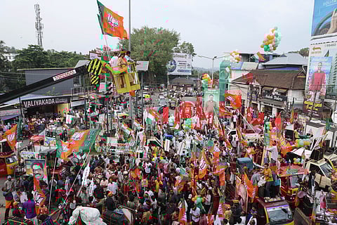 Workers of various political parties transform Peroorkada in Thiruvananthapuram into a sea of flags, colours, and slogans during the grand finale 'Kottikkalasam' on Sunday.
