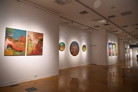 Artist Meena Yadav's artworks at the exhibition
