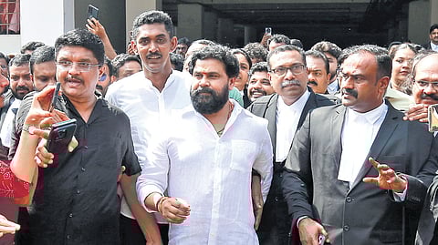 Actor Dileep comes out of Ernakulam District and Principal Sessions Court, along with his lawyers and supporters, after being acquitted in the actor assault case