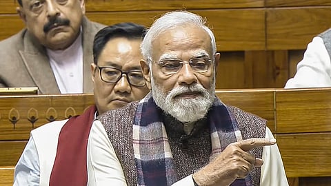 Prime Minister Narendra Modi speaks in the Lok Sabha during a discussion on the 150th anniversary of the national song 'Vande Mataram', at the Winter session of Parliament, in New Delhi, Monday, Dec. 8, 2025.