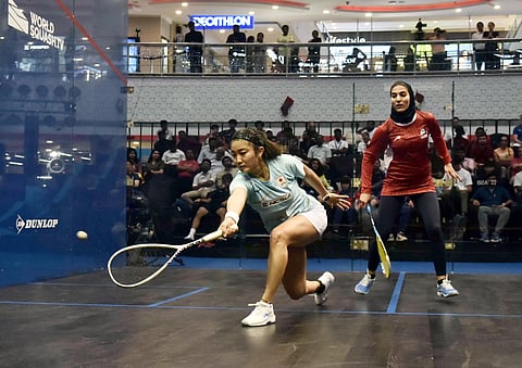 World No 6 Satomi Watanabe (L) in action against Fereshteh Eghtedari of Iran in the ongoing Squash World Cup in Chennai on Tuesday