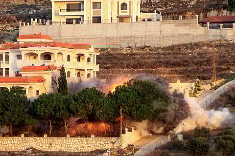 Smoke billows from the site of an Israeli airstrike that targeted the southern Lebanese village of al-Mjadel on December 4, 2025.