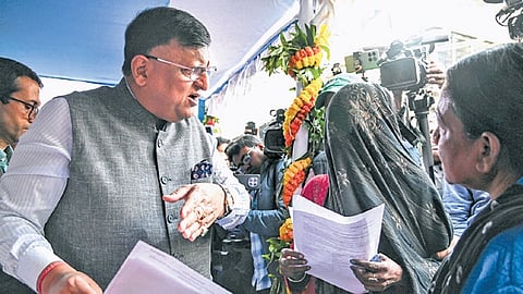 West Bengal CEO Manoj Kumar Agarwal with marginalised electors at a camp