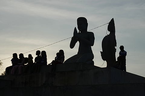 Children take refuge in Srey Snam, Siem Reap province after fleeing with their families from their homes at Cambodia's border with Thailand, Tuesday, Dec. 9, 2025.