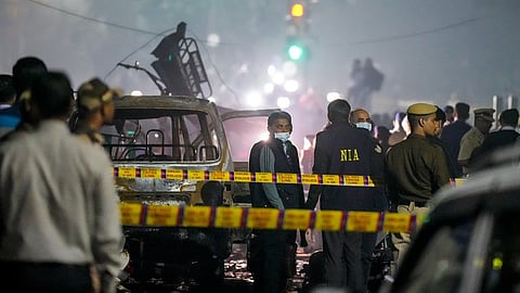National Investigation Agency (NIA) team at the spot after a blast occurred in a parked car near Red Fort.