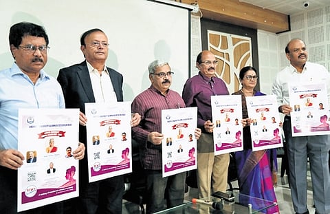 Andhra University Alumni Association office bearers releasing a poster of
WAVES 2025 in Vizag