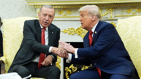 In this Sept. 25, 2025 photo, US President Donald Trump, right, shakes the hand of Turkish President Recep Tayyip Erdogan during a meeting in the Oval Office of the White House in Washington.