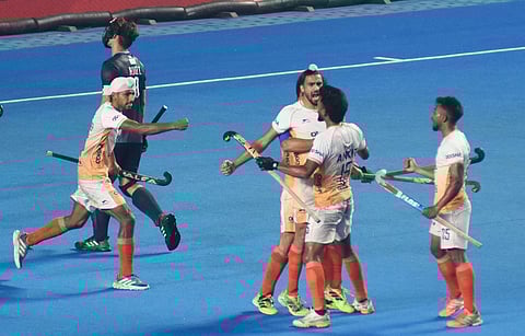 India players celebrate during their third-place match against Argentina on Wednesday