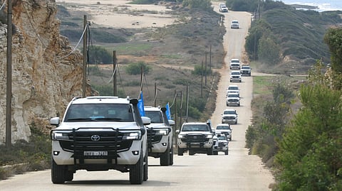 A convoy carrying a UN security council delegation, tours the border with Israel close to the southern Lebanese area of Naqura.