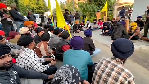 Members of the Sikh community gathered outside the residence of former Uttarakhand minister Harak Singh Rawat.