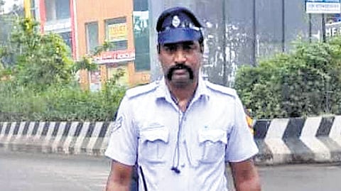 Traffic constable Meganathan.