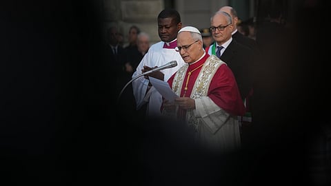 Pope Leo XIV speaks in front of the statue of the Virgin Mary next to the Spanish Steps in Rome, Monday, Dec. 8, 2025, on the Catholic Feast of the Immaculate Conception.