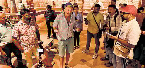 Kochi-Muziris Biennale curator Nikhil Chopra takes media on a walkabout through the venues on Thursday.