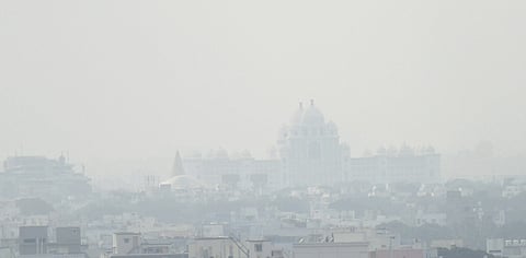 A view of the Secretariat as thick fog covers it in Hyderabad.