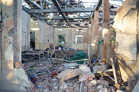 This picture shows a hospital damaged in a Myanmar military air strike that killed more than 30 people at a hospital in Mrauk U, western Rakhine state on December 11, 2025.