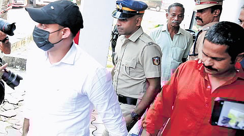 Second accused Martin Antony and third accused Manikandan B