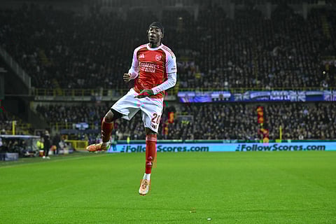 Arsenal's Noni Madueke celebrates after scoring the second goal during the UEFA Champions League, league phase - matchday 6, football match between Club Brugge and Arsenal at the Jan Breydel stadium in Bruges on December 10, 2025.